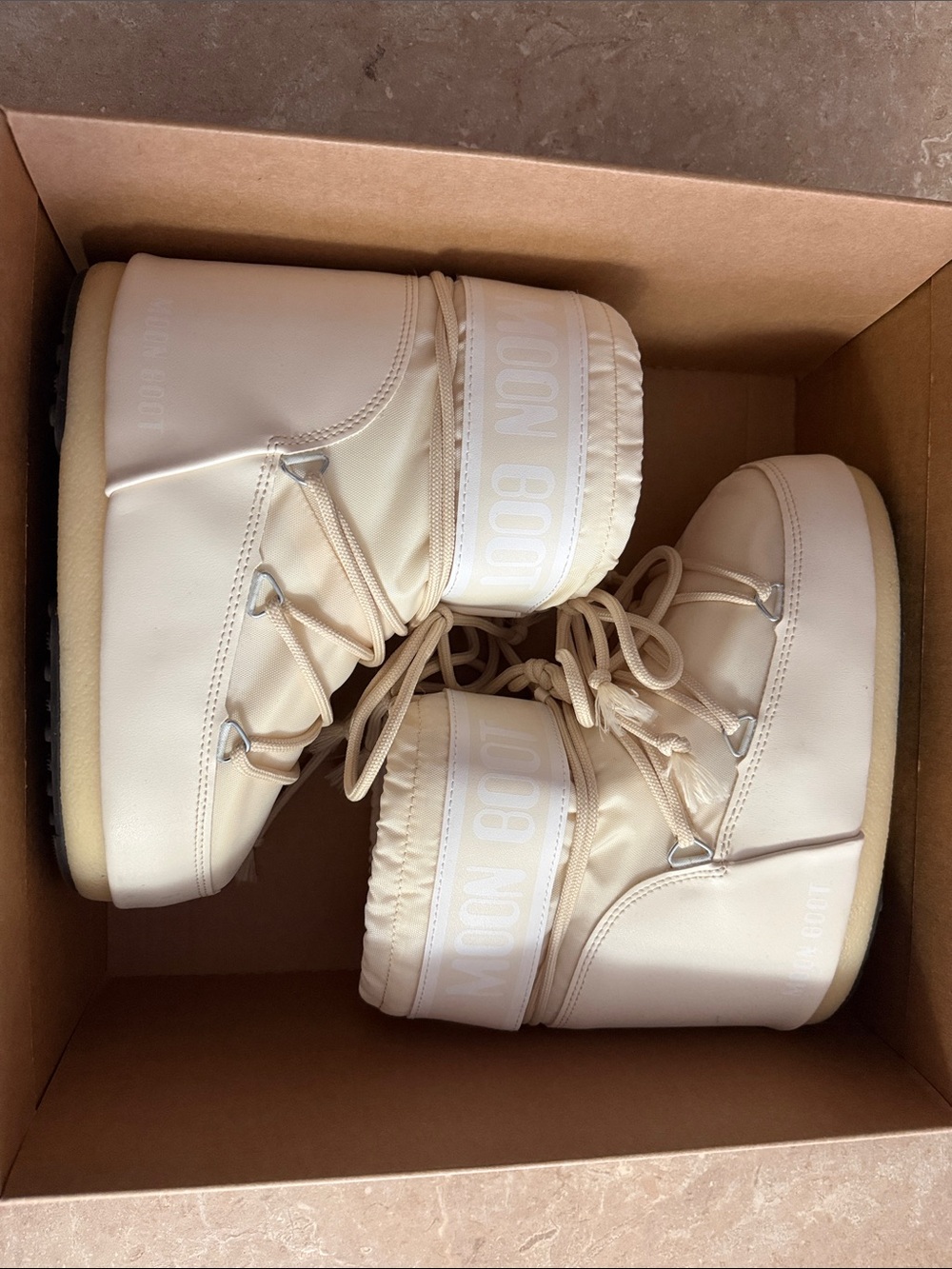 Moon Boot Women’s Cream Snow Boots with Lace-Up Front